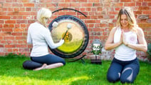 Woman meditating in front of a qigong