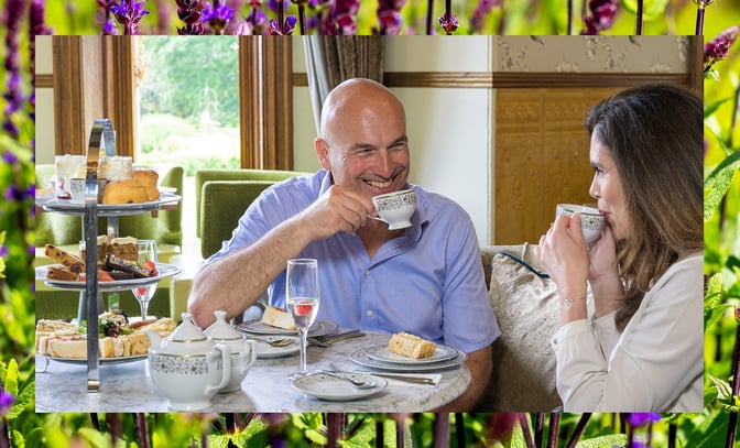 A couple of guests enjoy an afternoon tea