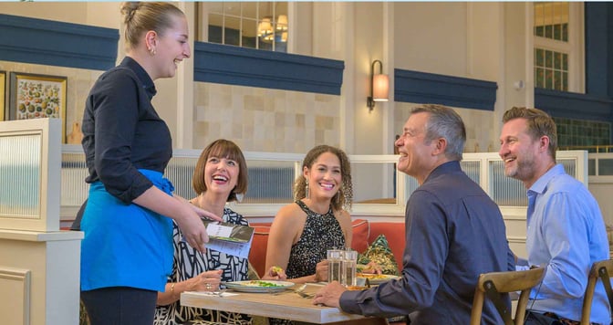 Group of friends dining together 